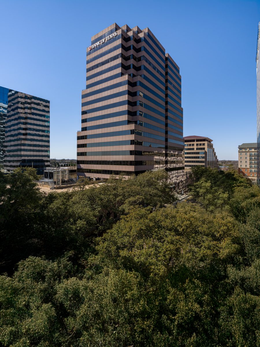 Sherry Lane Place in Preston Center Dallas — bronze-glass office tower with Bank of Texas signage, home to the JAMS Dallas Resolution Center on the 13th floor.